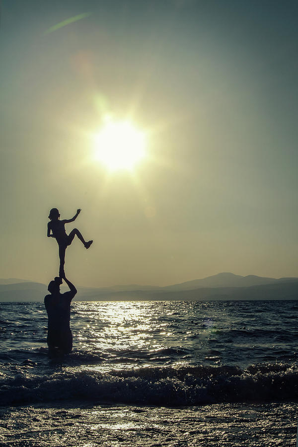 Acrobatic Balance Silhouette On Sea Photograph by Avi Morag Photography