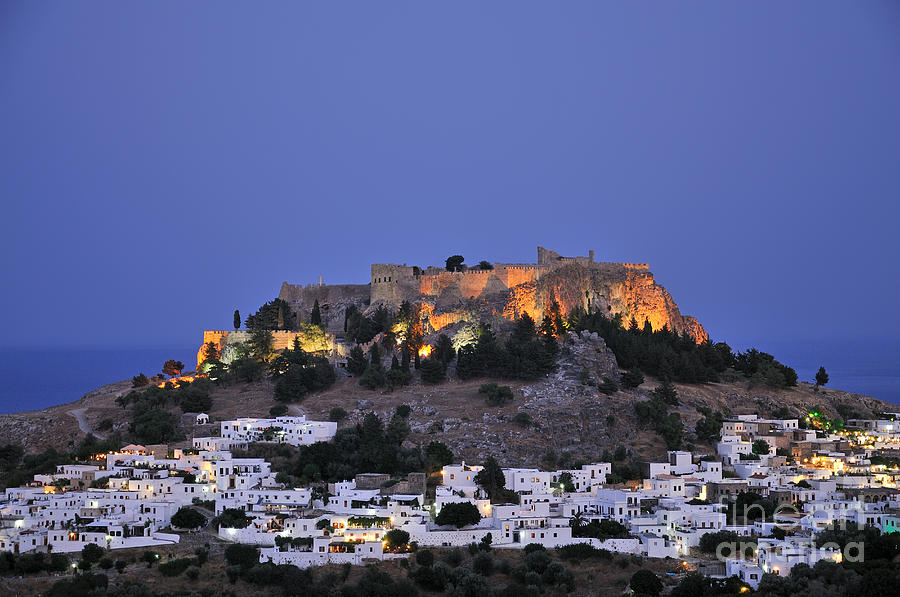 Acropolis and village of Lindos during dusk time Photograph by George Atsametakis