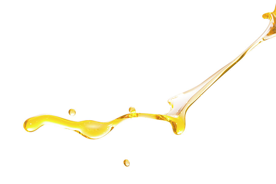 Active Oil Splash In White Background Photograph by Yaorusheng