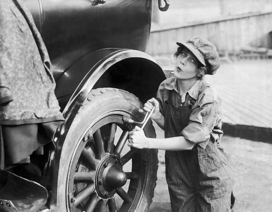 Actress Working On Her Car Photograph by Underwood Archives