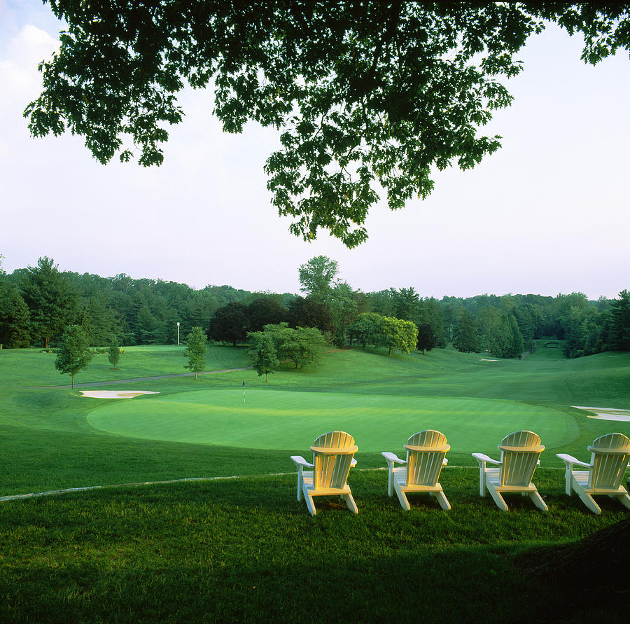Adirondack Chairs In A Golf Course Photograph by Panoramic Images