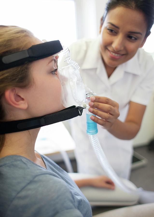 Adjusting Ventilator Mask Photograph by Science Photo Library