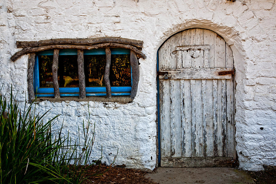 Adobe Door and Window Photograph by Peter Tellone