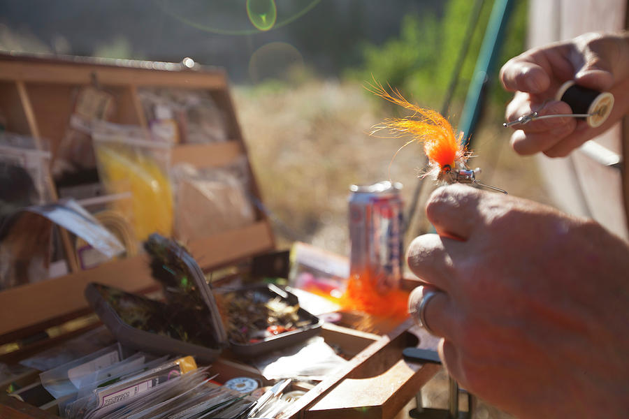 Fishing Photograph - Adult Fisherman Tying A Fly by Woods Wheatcroft Fishing Photograph - Adult Fisherman Tying A Fly by Woods Wheatcroft
