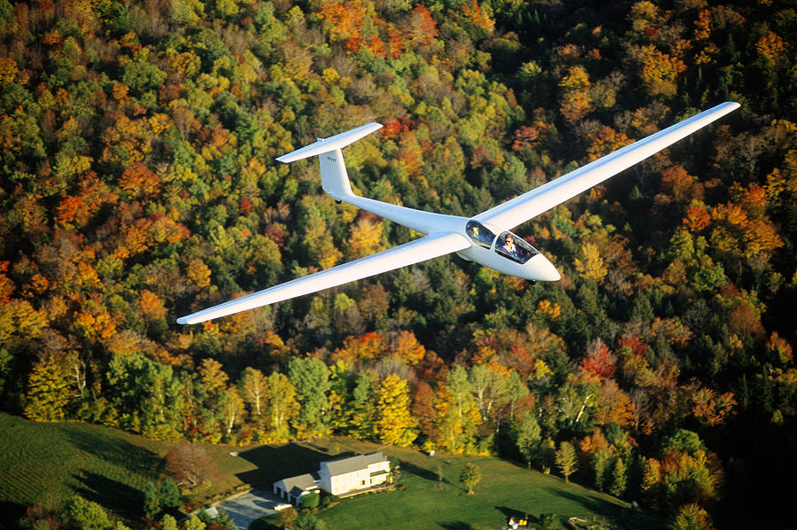 Aerial Of A Glider Cruising Over Autumn Photograph by Joseph Sohm