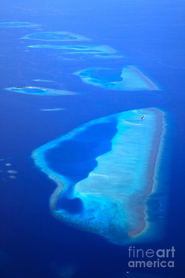 Aerial of islands in a atoll of the Maldives Photograph by Matteo Colombo