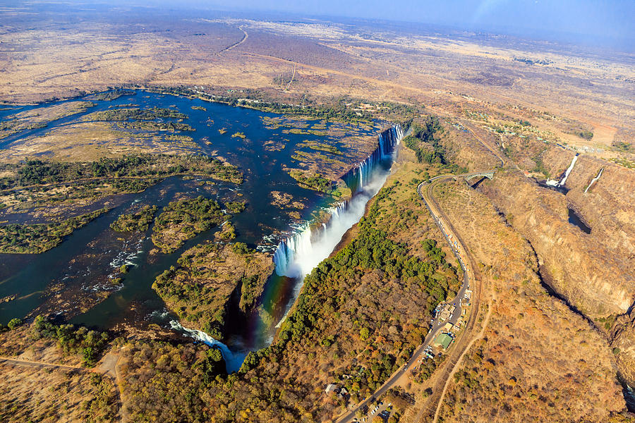 Aerial Victoria falls with rainbow, Livingstone, Zambia/Zimbabwe Photograph by Maria Swärd