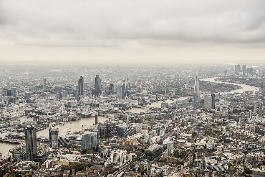 Aerial view City of London on a cloudy day Photograph by Johnny Greig