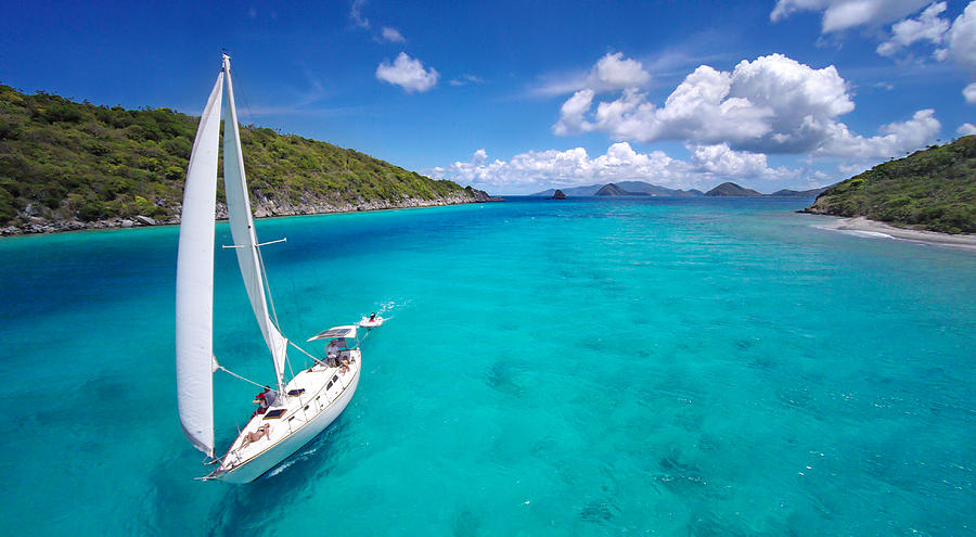 aerial view of a sailboat travelling through the Caribbean Photograph by Cdwheatley