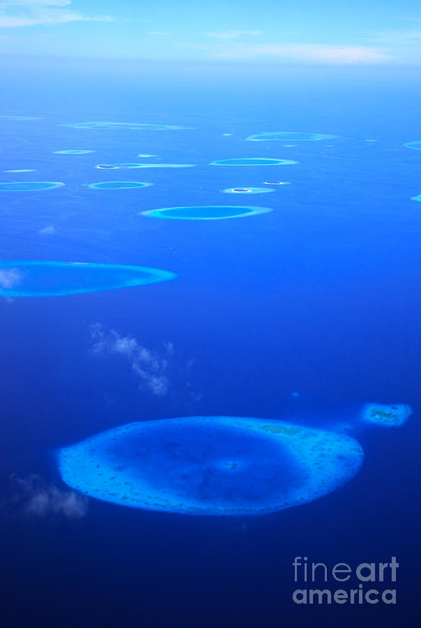 Summer Photograph - Aerial view of atoll in the Maldives by Matteo Colombo