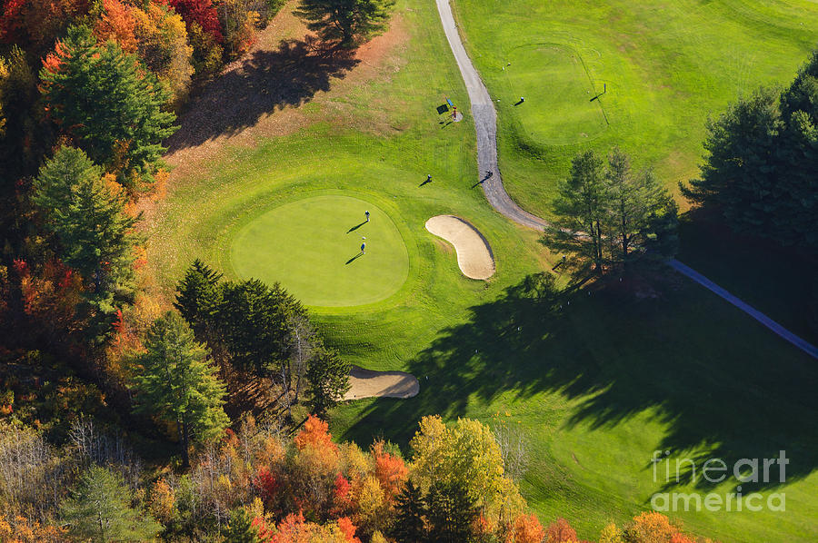 Aerial view of fall foliage and a golf course in Stowe Vermont Photograph by Don Landwehrle