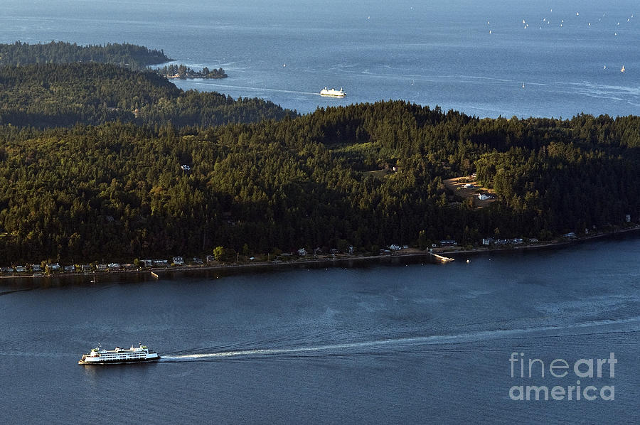 Aerial view of Ferry boats on Puget Sound one leaving Bainbridge Photograph by Jim Corwin