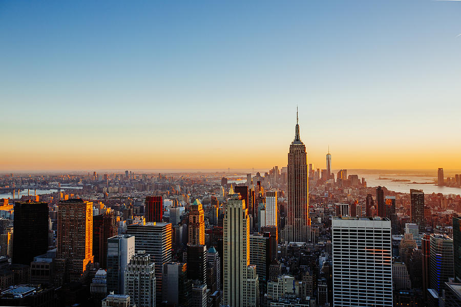 Aerial view of Manhattan skyline at sunset, New York City, USA Photograph by Alexander Spatari