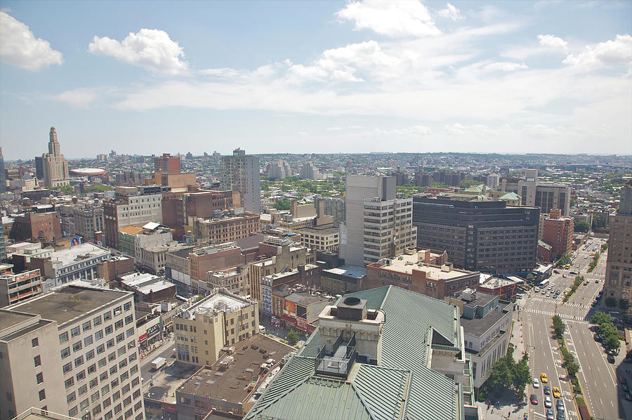 Aerial View Of Rooftops And City Skyline Photograph by Barry Winiker