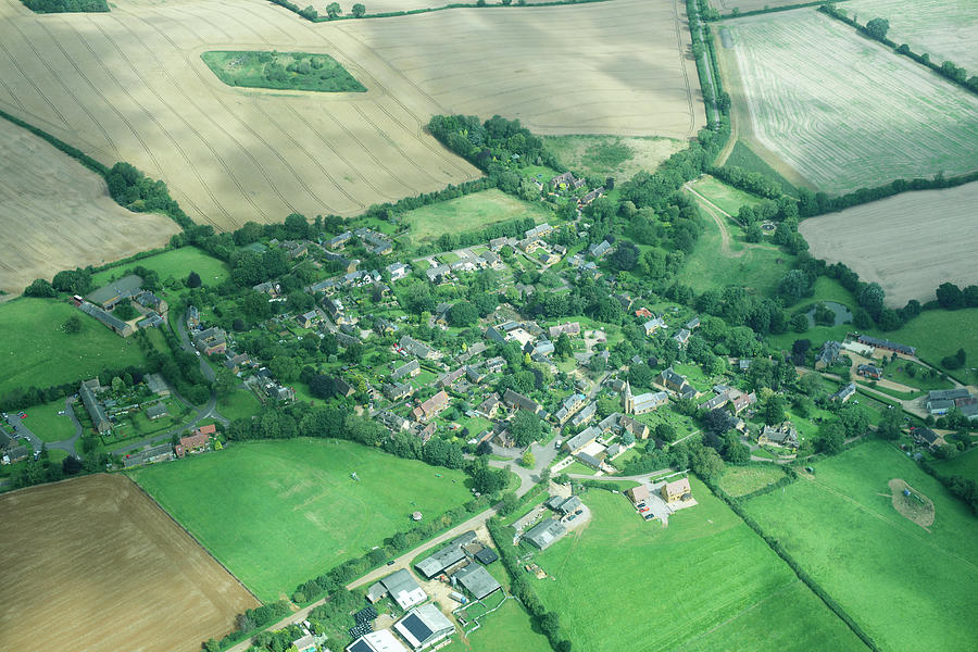 Aerial View Of Rural Town And Fields Photograph by Peter Muller