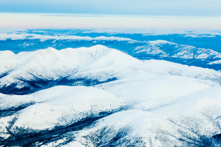 Premium Photo | Aerial View Of Snowy Mountains Blue Sea With Frosty