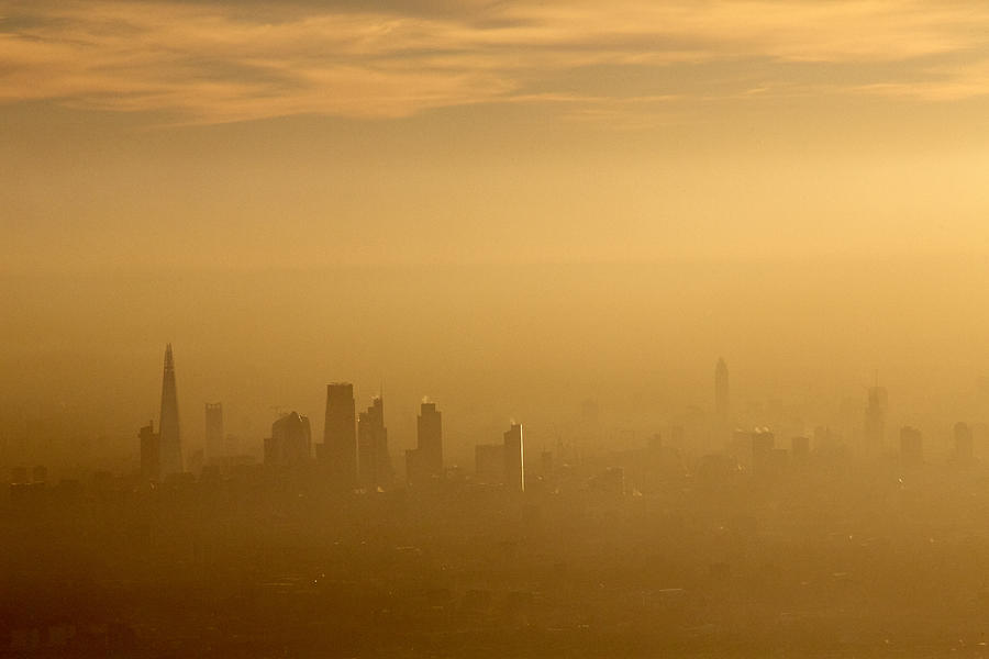 Aerial view South across the city of London in fog and or air pollution Photograph by Andrew Holt