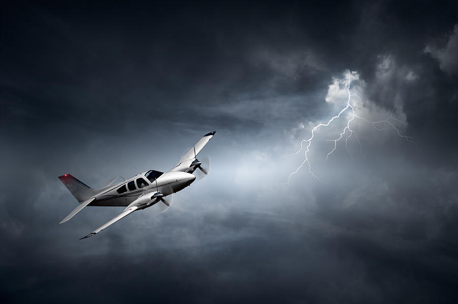 Transportation Photograph - Risk - Aeroplane in thunderstorm by Johan Swanepoel