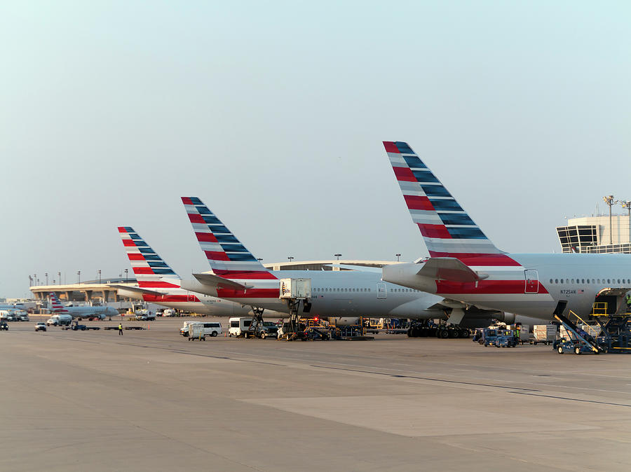 Aeroplanes At Airport Gates Photograph by Daniel Sambraus/science Photo Library