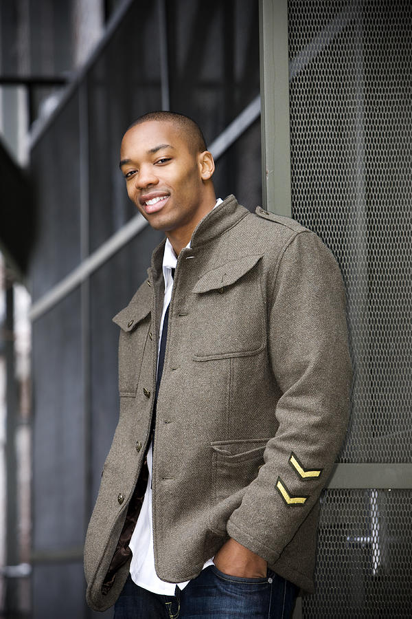 African American Young Male Fashion Model Posing Downtown in Jacket Photograph by Quavondo