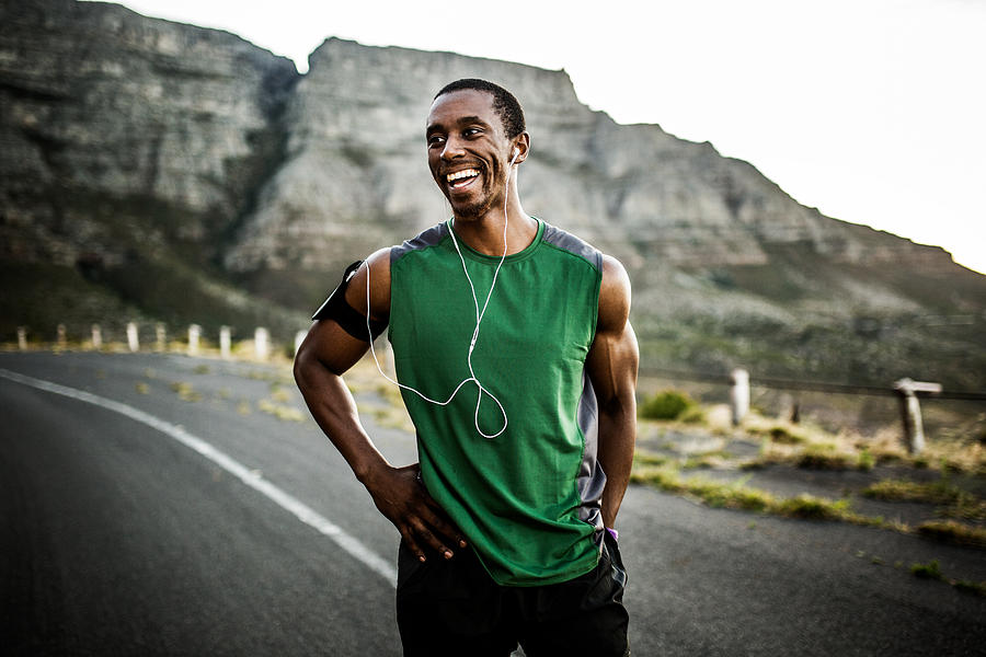 African athlete smiling positively after a good training session Photograph by Wundervisuals