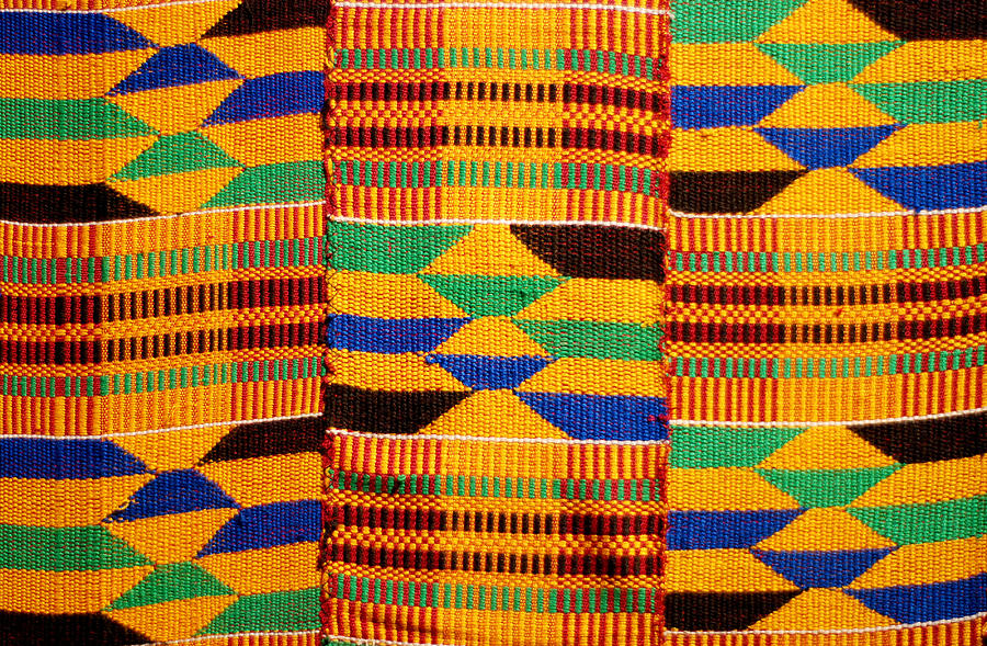 African colored pattern fabric background Photograph by Ilbusca