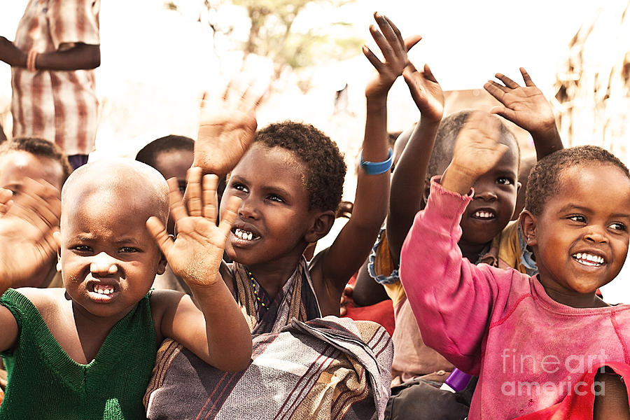 African kids with hands up Photograph by Anna Om
