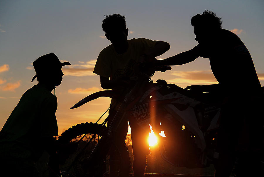 Sunset Photograph - After The Race by Miel  Paculanang