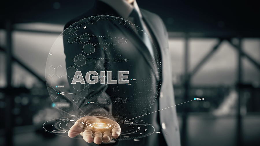 Agile with hologram businessman concept Photograph by Ankabala