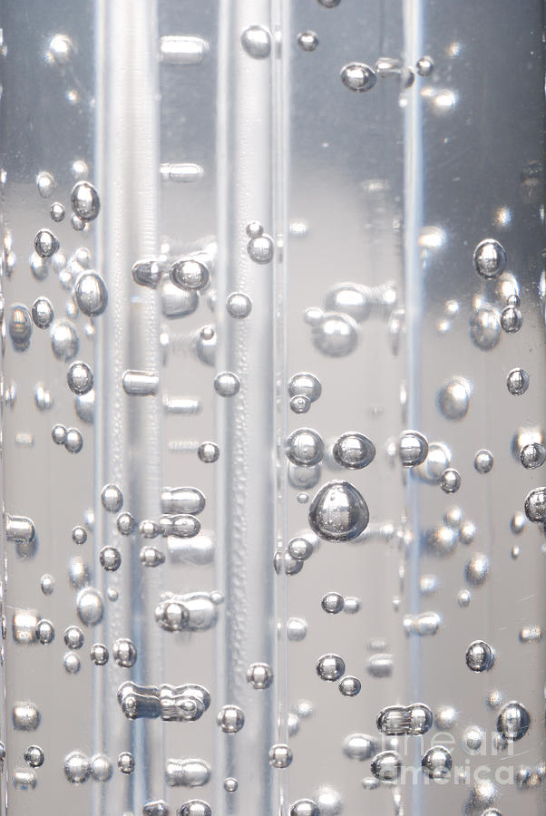 Trapped Photograph - Air Bubbles In A Clear Liquid by Gary Silverstein