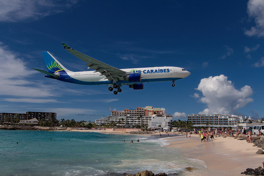 Air Caraibes landing at St. Maarten Photograph by David Gleeson