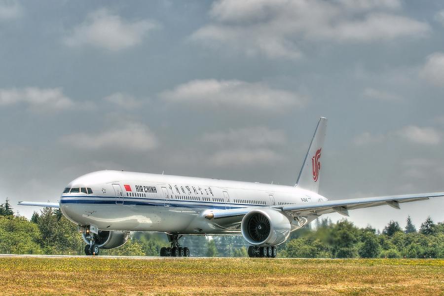 Air China 777 Photograph by Jeff Cook