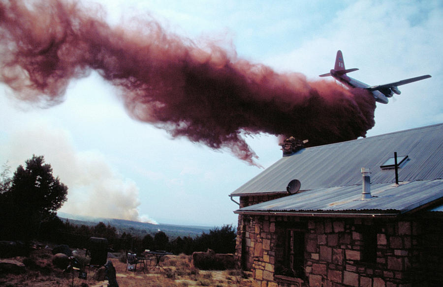 Building Photograph - Aircraft Releases Fire Retardant by Kari Greer/science Photo Library