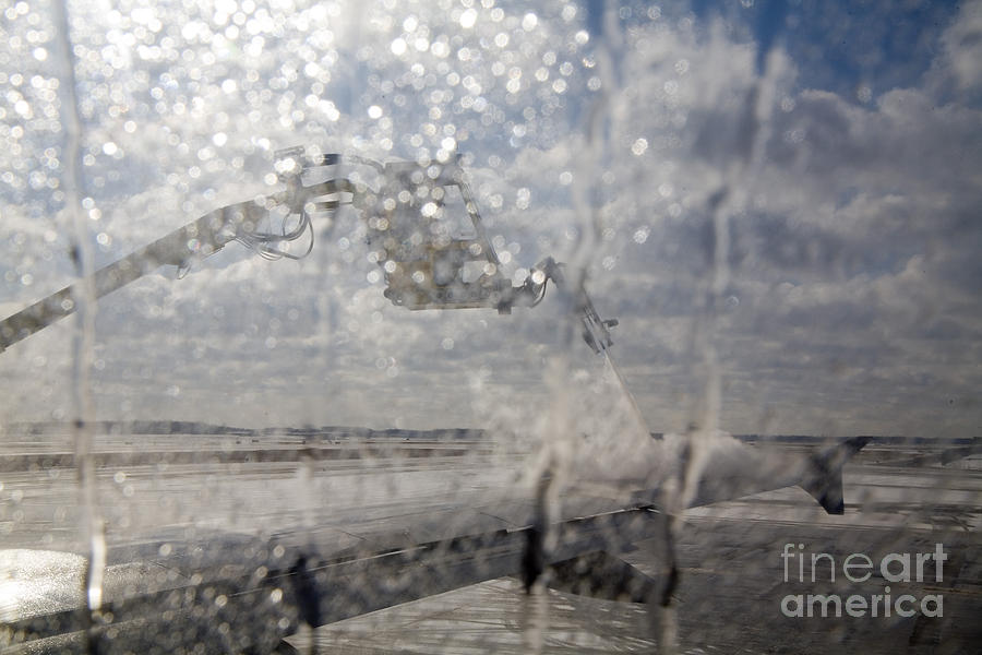 Airliner Deicing Photograph by Jim West