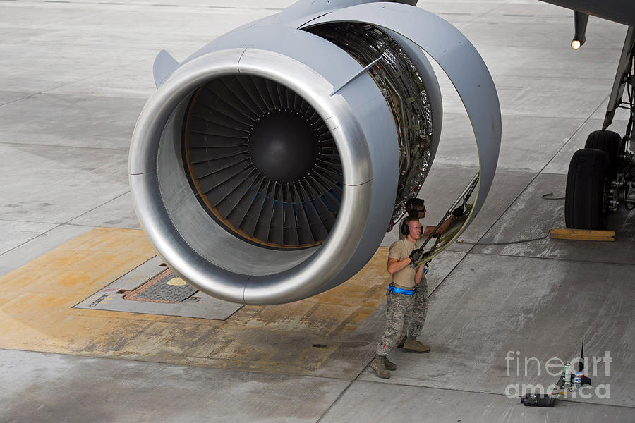 Airmen Lower An Engine Panel On A Kc-10 Photograph by Stocktrek Images