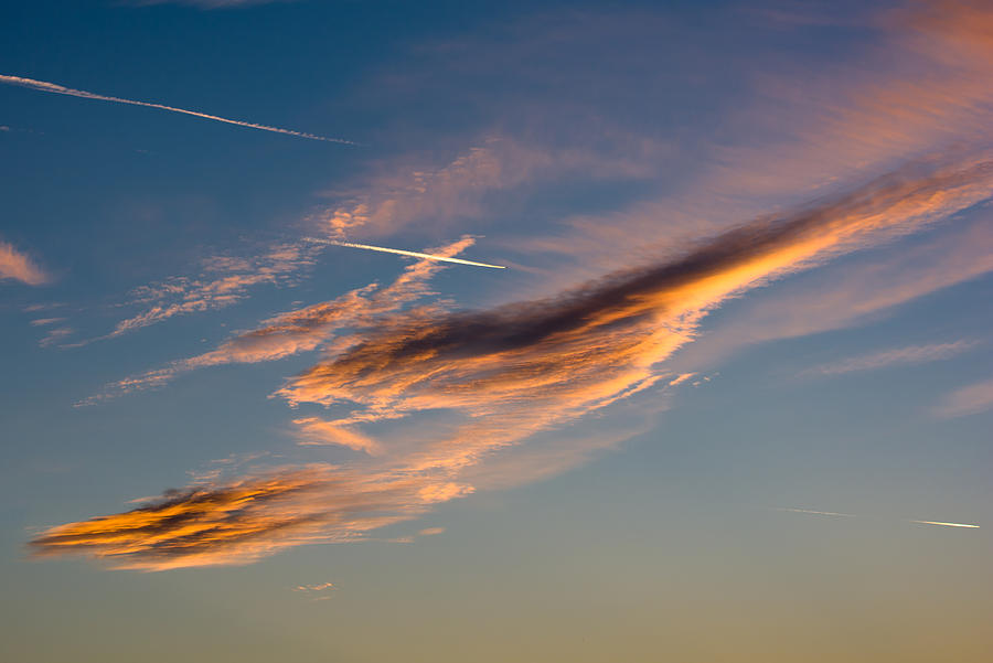 Airplane And Sunset Clouds Photograph by Andreas Berthold