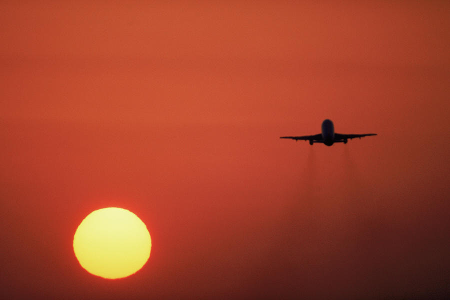 Airplane Ascending Photograph by Peter Essick