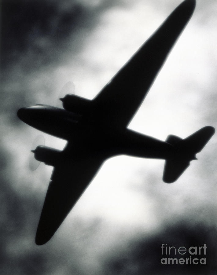 Black And White Photograph - Airplane silhouette by Tony Cordoza