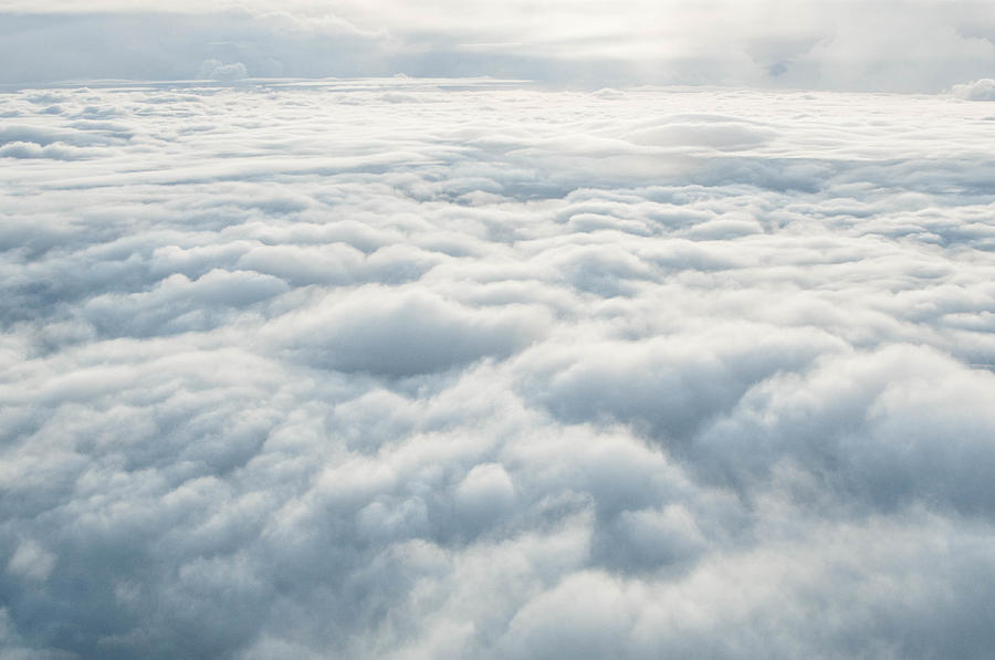 Airplane window cloudscape Photograph by Karl Tapales