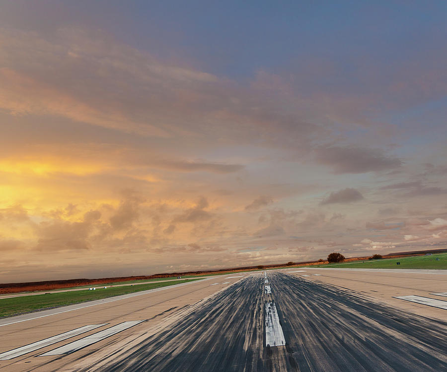 Airport Runway At Sunset Photograph by John Lund