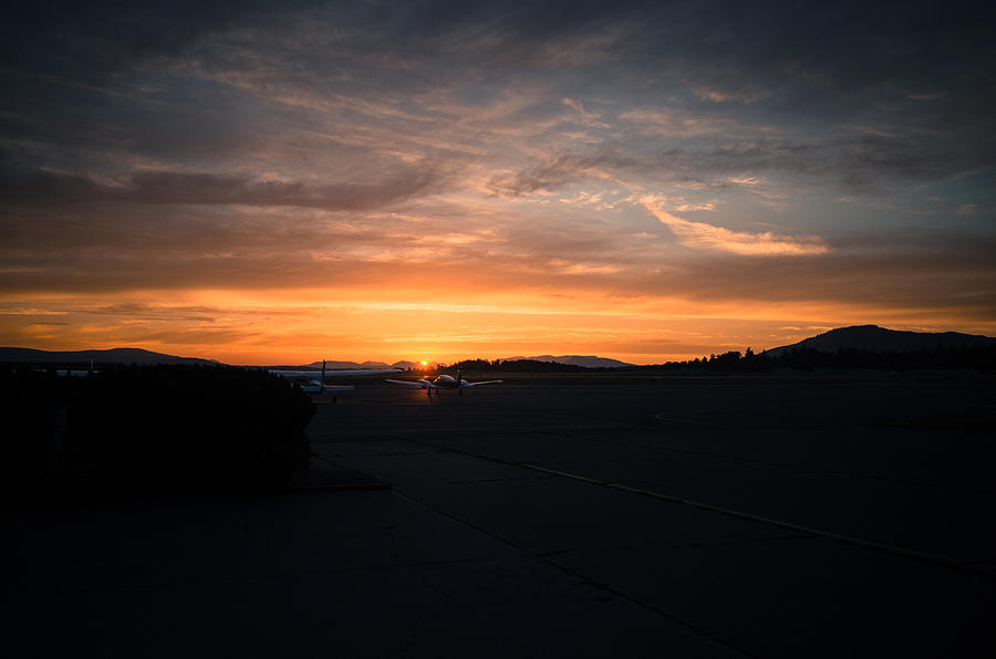 Sunset over the Airport Photograph by Marilyn Wilson
