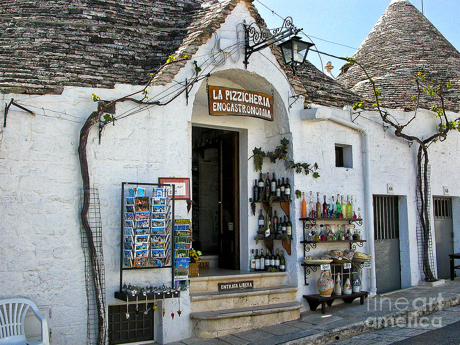 Wine Photograph - Alberobello Stores by Timothy Hacker