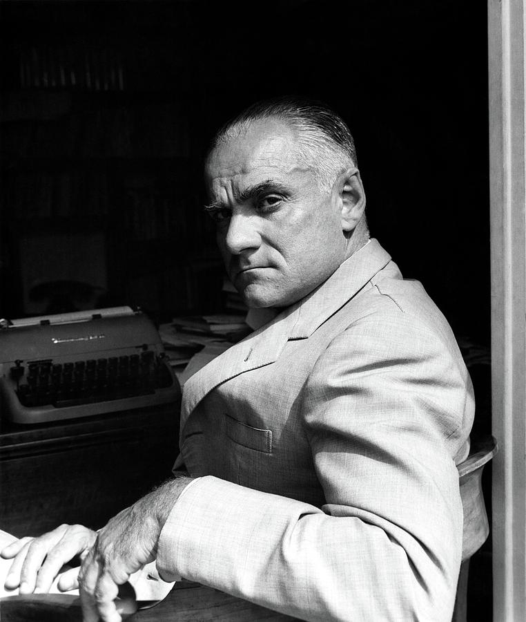 Alberto Moravia Sitting At His Desk Photograph by Horst P. Horst