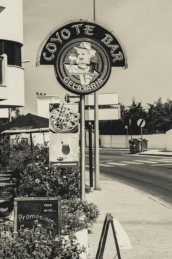 Vintage Photograph - Albufeira Street Series - Coyote Bar I by Marco Oliveira
