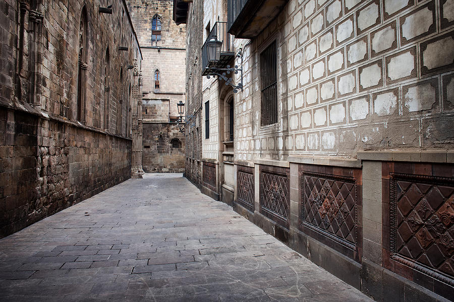 Alley in the Gothic Quarter of Barcelona Photograph by Artur Bogacki