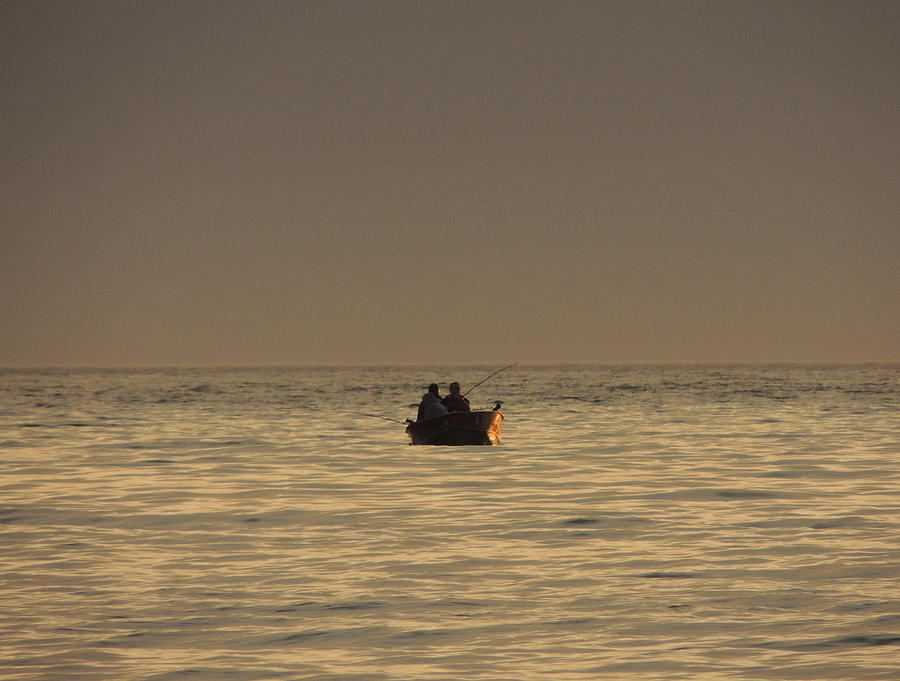 Sunset Photograph - Alone at Sea by Karen Horn