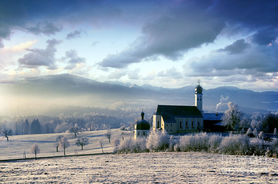 Christmas Photograph - Alpine scenery with church in the frosty morning by Michal Bednarek
