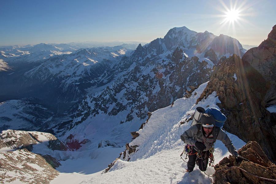 Alpinist Arriving At The Summit Photograph by Jonathan Griffith - Fine ...