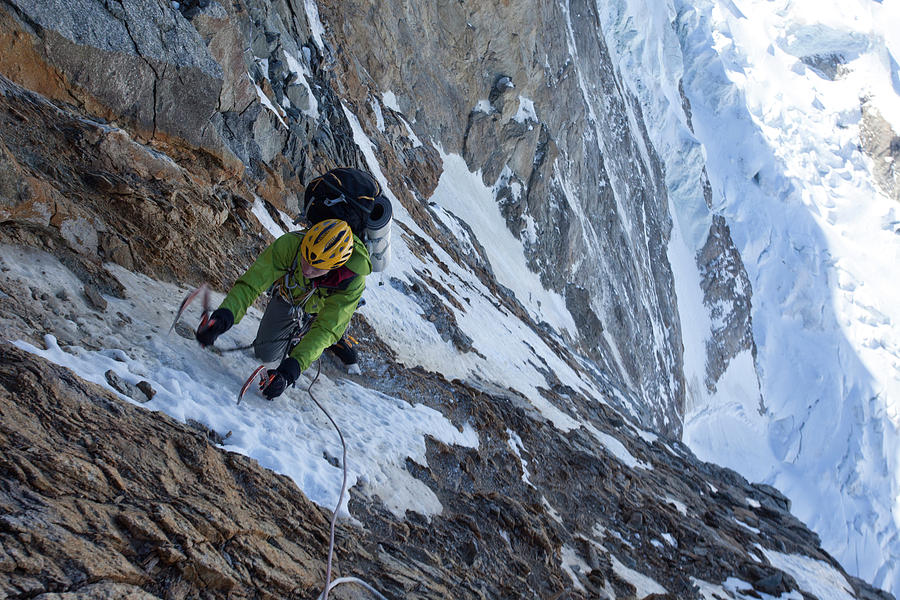 Alpinist Carrying A Haul Bag Photograph by Jonathan Griffith | Fine Art ...