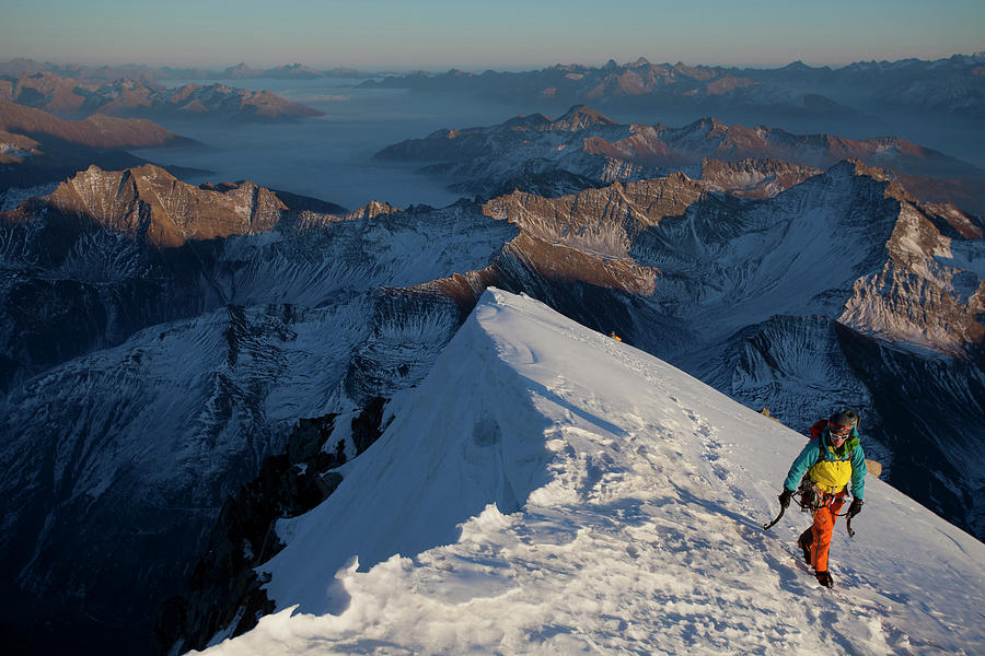 Alpinist Taking His Last Few Steps Photograph by Jonathan Griffith ...